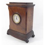 A walnut mantel clock with replacement movement, 19cm high