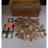 A carved wooden box containing approx 2 kilos of pre-decimal and decimal coinage including