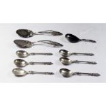 Six silver plated apostle teaspoons with Victorian lozenge mark to reverse, a similar caddy spoon