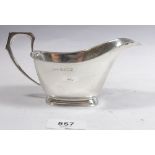 An Irish silver sauce boat on plinth foot, Dublin 1966, makers mark J.M.C, 172g