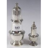 A silver pepper pot, Birmingham 1903, 33g and a silver sugar caster, London 1960, 167g