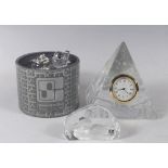 A Dartington glass pyramid clock, two Swarovski glass animals and a Mats Jonasson glass duck