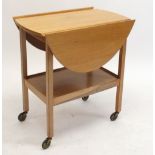 An Ingle Stats oval dropleaf beech trolley/table