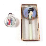 A Japanese glass perfume bottle and a Japanese jade hand mirror with case