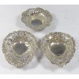 A Victorian pair of silver heart shaped bon bon dishes and one other Chester, 1896, combined