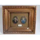 A pair of late 19th century miniature portraits, watercolour on card, mounted in an ornate frame