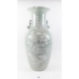 A Chinese celadon glazed baluster vase with dogs of fo to shoulders and floral decoration, 43cm tall