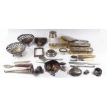 An assortment of silver to include two silver openwork bowls, silver mounted brushes, silver mounted