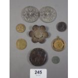 A box of coins to include George III 1797 penny, George III 1799 farthing, Georgian gaming token and