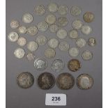 A quantity of silver content coinage including: George IV 1829 shilling, Victoria 1888 half crown,