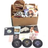 A quantity of single 45 rpm records including examples from 1970's etc.