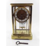 A 19th century French four glass mantel clock with mercury compensated pendulum and striking on a