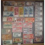 A wad of world banknotes including Bank of England 10 shillings pre-fix DO2N J S Fforde, British