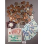 A miscellaneous lot of British and world coinage and banknotes including British: pre-decimal
