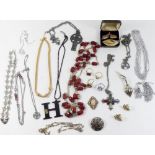 An assortment of named vintage and later costume jewellery to include Trifari, Miracle, Adrien Mann,