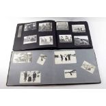 Photograph albums (2) containing mix family/military life photos include 1942 Malta convoy with