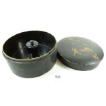 An oriental lacquer box with turned dice holder within, 18.5cm diameter