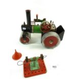 A Mamod model steam roller with grinding wheel and funnel