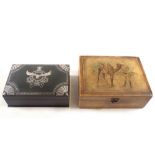 A wooden WWI cigarette box painted camel and solider for the camel regiment and a metal cigarette