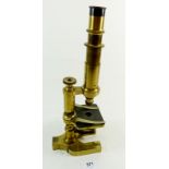 A late 19th century French brass monocular microscope