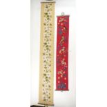 Two floral tapestry bell pull style wall hangings