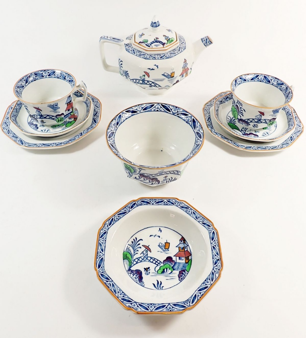 A KBC 'Westover' tea service with Chinoiserie decoration comprising teapot, four tea cups, four