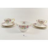 A Shelley tea service 'Rose Trellis' comprising five cups and six saucers, six plates and sugar