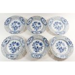 A set of six 20th century Meissen Onion pattern plates with pierced borders, 23cm diameter