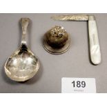 A Georgian silver caddy spoon with bright cut decoration, Birmingham 1829, a silver and mother of