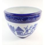 A Minton blue and white willow pattern jardinière, 20cm tall