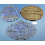 Stable plaques given as war horse show prizes and a cast iron plaque - dated 1909 and 1910