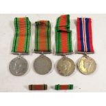 Three WWII defence medals and war medal