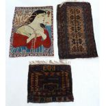 Two antique saddlebag small rugs and a Persian handwoven wall hanging