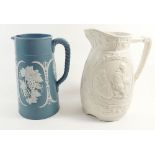 A Victorian Cork & Edge press moulded jug 'Ruth' and a blue jug with applied vine decoration