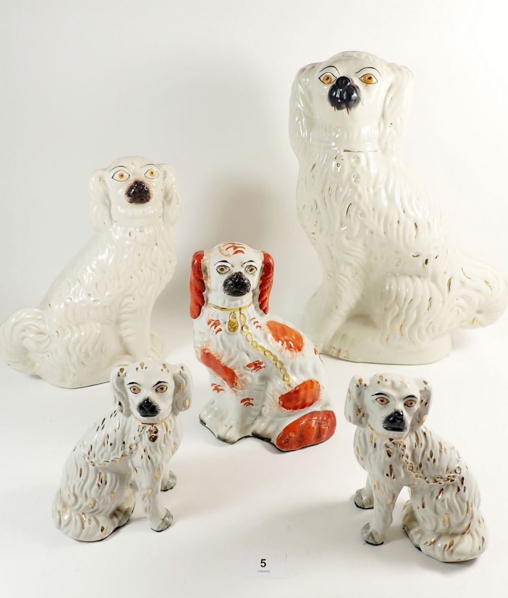 Five Victorian Staffordshire dogs (the larger one a/f), largest 37cm