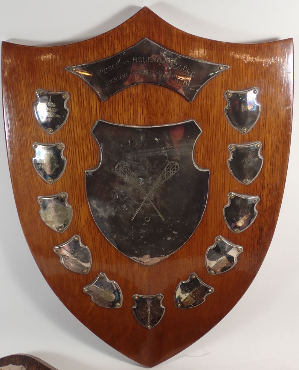 An oak lacrosse shield from Princess Helena College set with silver plaques and two similar, with - Image 2 of 4