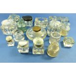 A collection of glass inkwells