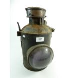 An old lantern - possibly a railway lamp 1920 with bulls eye lens