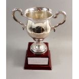 A silver challenge cup, London 1910, weight of cup with metal screw and brackets to base 303g