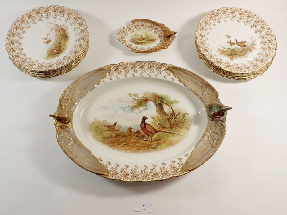 A Royal Worcester Vitreous game service comprising meat dish with bird head handles, twelve plates