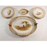 A Royal Worcester Vitreous game service comprising meat dish with bird head handles, twelve plates