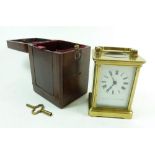 A late 19th century brass carriage clock in leather case