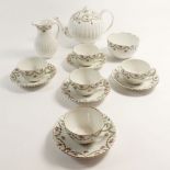 A Booths child's tea set printed rose buds comprising a teapot, jug, sugar, six cups and saucers (