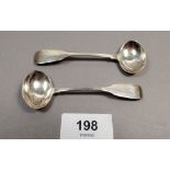 A pair of Irish silver salt spoons, Dublin 1928, by IB