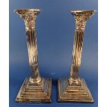 A pair of large silver-plated Corinthian column candlesticks, 29cm