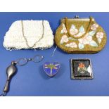 Two vintage beaded bags, an enamelled heart shaped butterfly trinket box, a vintage compact and