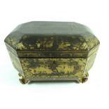 A 19th century Chinese export black and gilt lacquer tea caddy fitted two pewter tea caddies, 21 x