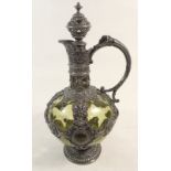 A Renaissance style green glass and pewter claret jug, 26cm tall