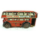 A Brimtoy tin plate clockwork bus