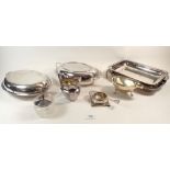 A group of silver-plated items including two entree dishes